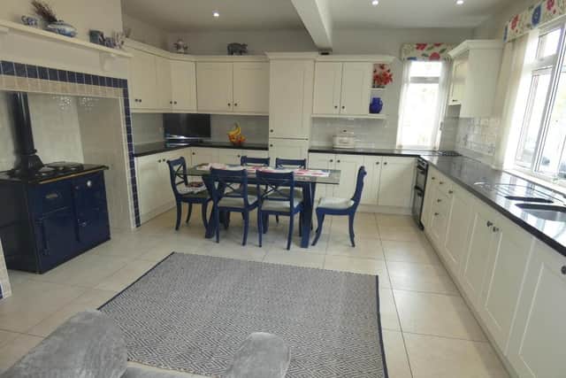 The property has a large kitchen/dinette with feature range cooker and recently fitted bright units