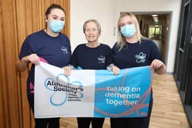 From left to right are: Nicole Wright, support worker,  tenant Doreen Moses, who was a co-founder of Dementia NI and Gail Kirkland, team leader, who spearheaded the fundraiser and walk.