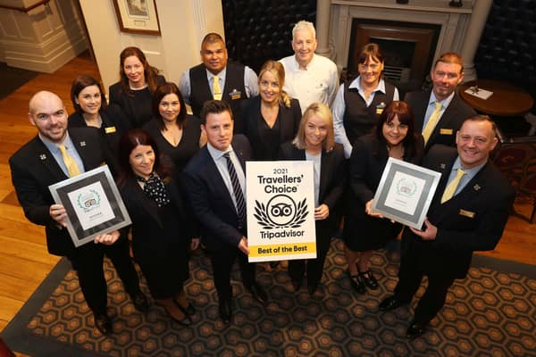 Staff and management at Bishop’s Gate Hotel with the TripAdvisor Travellers’ Choice Award