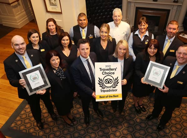 Staff and management at Bishop’s Gate Hotel with the TripAdvisor Travellers’ Choice Award