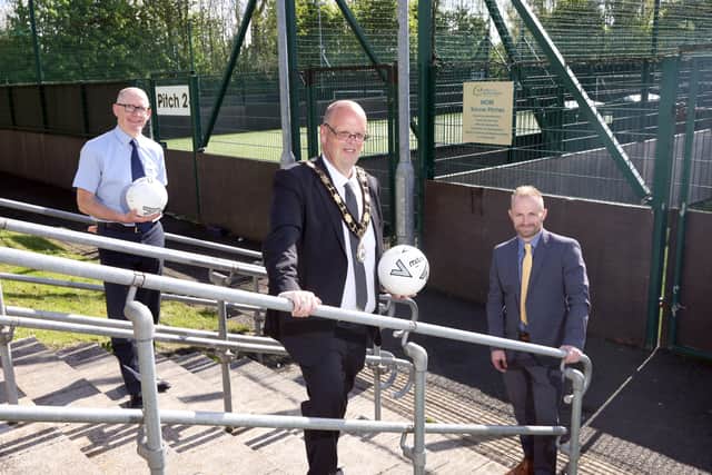 Mayor of Antrim and Newtownabbey, Cllr Jim Montgomery with Valley Leisure Centre Manager, Declan Sheridan and Head of Leisure, Matt McDowell at the official reopening of the MOR pitches following £150k investment.