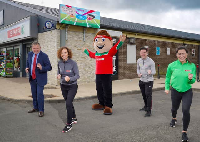 Principal Mr Jim Brady, St. Brigid’s Primary School Ballymena and Sinead Connolly, owner of SPAR Dunclug is pictured with Sammy SPAR, Paul Carvill from Healthy Kidz and Laura McKee from Henderson Group to celebrate over 300 schools across NI signing up for the Healthy Kidz Sports Day, in partnership with Henderson Group.
 Photo by Aaron McCracken