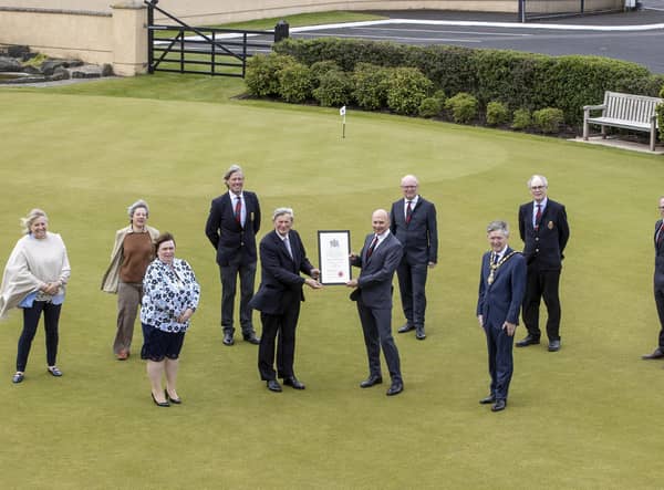 Pictured at Royal Portrush Golf which received the Freedom of the Borough from Causeway Coast and Glens Borough Council on May 21 are front (left-right), Mayoress Mrs Phyliss Fielding, David McCorkell, Lord Lieutenant for County Antrim, Dr Ian Kerr, Captain and the Mayor of Causeway Coast and Glens Borough Council Alderman Mark Fielding. Back row (left-right), Nicky Smith, Captain of the Ladies branch, Kath Stewart-Moore, President of the Ladies branch, Robert Barry, immediate past Captain, David McMullan, Honorary Secretary, Sir Richard McLaughlin, President and John Lawlor General Manager.Picture Steven McAuley/McAuley Multimedia