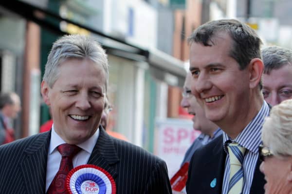 Former DUP leader Peter Robinson (left) said leader elect Edwin Poots (right) ‘will not unite unionism if he cannot unite his own party’. 
The two men are seen here together on the election trail in Lisburn in 2011. Photo: Presseye.com.