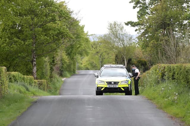 Police on the Irish Hill Road outside Ballyclare.
Photograph by Declan Roughan / Press Eye
