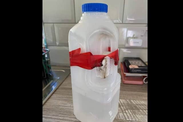 Bottle of flammable liquid found uner a car in Aghgallon.