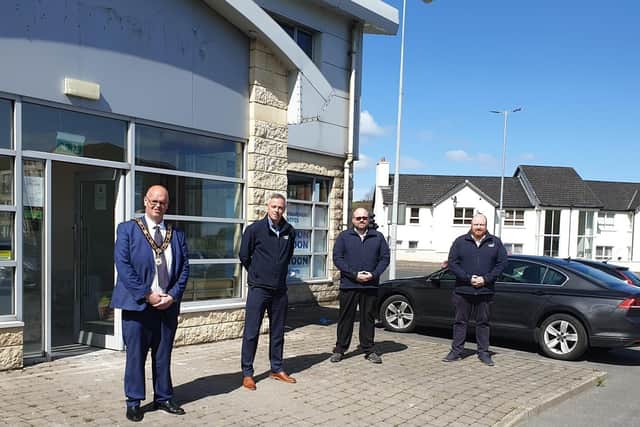 Mayor of Antrim and Newtownabbey, Cllr Jim Montgomery with Gary Kee (HHI Newtownabbey Branch Manager), David Dickson (HHI Kitchens Manager) and Stephen Burgess (HHI Sales and Marketing Manager) at their new premises in Glengormley.