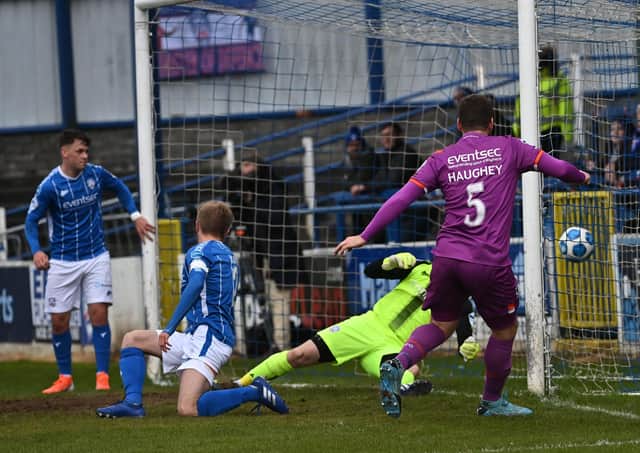 Mark Haughey opens the scoring for Linfield against Coleraine in the Premiership top-of-the-table clash. Pic by Pacemaker.