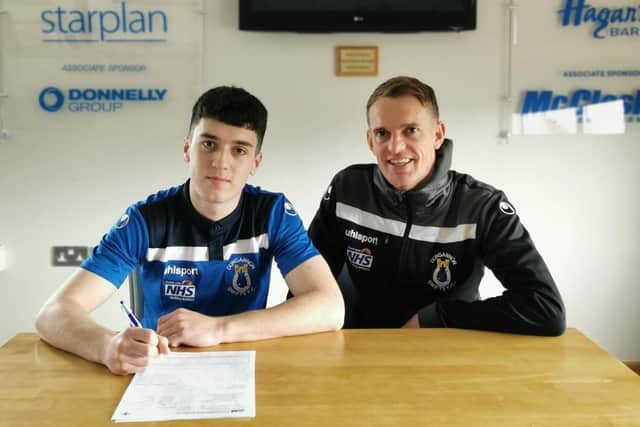 Darragh McBrien along with Dungannon Swifts manager Dean Shiels at the confirmation of the player's signing. Pic by Dungannon Swifts.