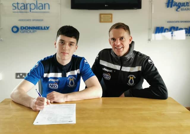 Darragh McBrien along with Dungannon Swifts manager Dean Shiels at the confirmation of the player's signing. Pic by Dungannon Swifts.