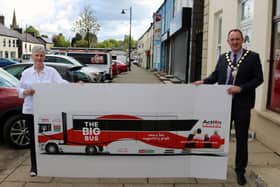 Chair of Mid Ulster District Council Cathal Mallaghan and Anne Nelson, Chair of Cookstown Action Cancer Group launch the charity’s new Big Bus.