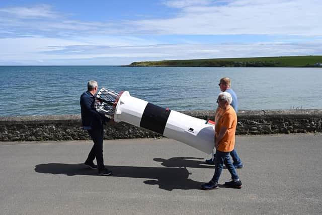 The wooden structure, which took several months to construct in Maghaberry Prison, being relocated to Hope House Cottage on the beach at Brown's Bay, Islandmagee. Picture: Michael Cooper