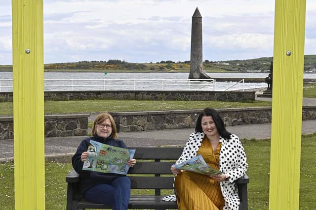 Helping Lynda Hill (left) from Larne Renovation Generation to put Larne firmly on the tourist map is Gemma-Louise Bond (right) from Power NI.
