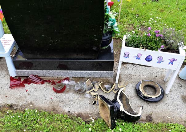 Police in Newtownabbey received a report that a number of graves had been damaged in Carnmoney Cemetery. Picture by: Arthur Allison, Pacemaker.
