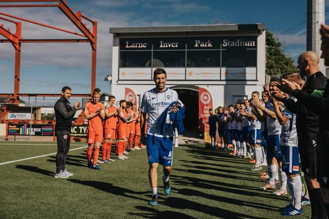 Steven Douglas is given a guard of honour by the Coleraine and Larne players before Saturday's game. PICTURE: David Cavan