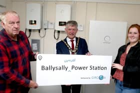 The Mayor of Causeway Coast and Glens Borough Council Alderman Mark Fielding pictured with Samantha Watt and Adrian Eakin in the Project Girona power station at Ballysally
