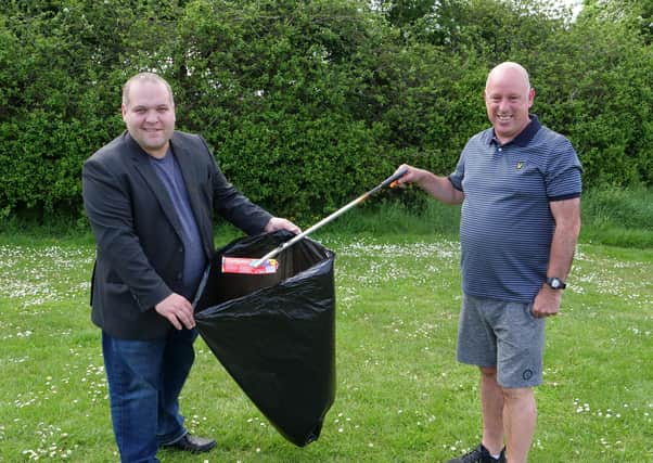 Councillor Nathan Anderson, Chairman of the Council’s Environmental Services Committee pictured with Colin Tinsley