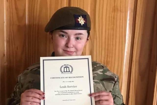 inbt Cadet Leah Service Proudly Displays her BCA Certificate of Recognition