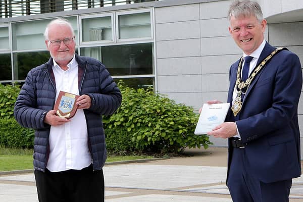 Douglas McClarty, author of Plastic Sandals, pictured with the Mayor of Causeway Coast and Glens Borough Council Alderman Mark Fielding
