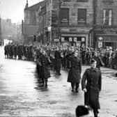 Members of Lancaster's Home Guard parade past the Town Hall in Dalton Square in 1944. Picture: JPIMedia Archives
