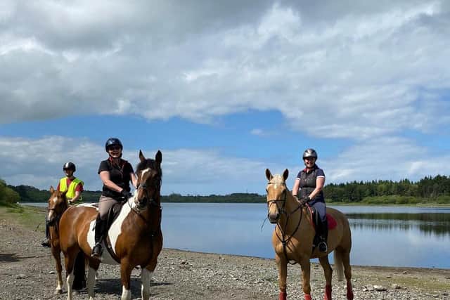 Horse riders pictured at Lough Mourne.