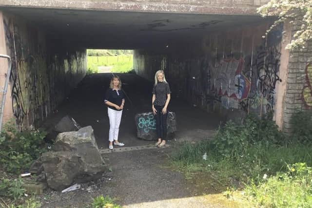 DUP Cllr Margaret Tinsley with colleague and MP Carla Lockhart at an underpass in Craigavon.