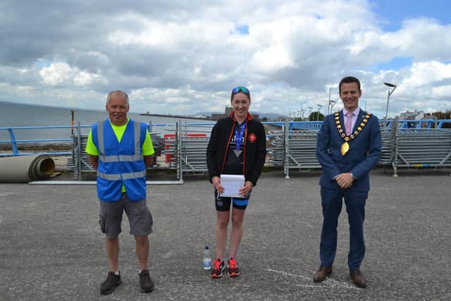 Catherine Sands, winner of the Female sprint, with  former Mayor, Cllr Peter Johnston and Gary Davison, organiser.