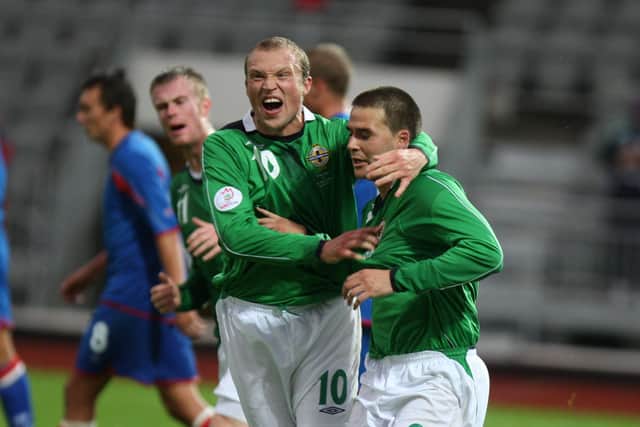 Northern Ireland strike partners Warren Feeney and David Healy celebrate a goal against Iceland in a Euro 2008 qualifier
.
 PHOTO MARK PEARCE/PACEMAKER