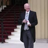 Alderman Tommy Nicholl pictured in 2006 at Buckingham Palace after being awarded the MBE. Ald Nicholl was presented with a special tribute recently to mark 40 years as a councillor in the Bannside area.