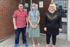 Residents of Locke House, Emmett McKay  and Natasha Stitt with the Acting Manager Christine Bracewell (centre).