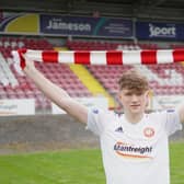 Harry Anderson signs for Portadown. Pic courtesy of Portadown FC.