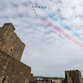The Red Arrows fly over Carrickfergus Castle. Picture by Matt Mackey / Press Eye.