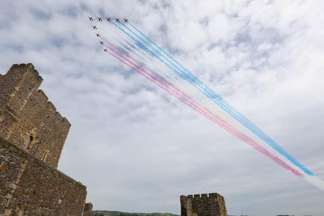 The Red Arrows fly over Carrickfergus Castle. Picture by Matt Mackey / Press Eye.