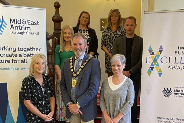 At the launch of the 2021 Larne Business Excellence Awards are, front row,from left Nicola Rowles, Director of Development, Mid and East Antrim Borough Council; Mayor, Councillor William McCaughey and Valerie Martin, senior weeklies editor, jpimedia, publishers of the Larne Times. Back row: Catherine Henderson, LEDCOM; Diane Burke, Grace Clements, jpimedia and Niall Curneen, general manager of Larne Football Club, for Brighter Futures.