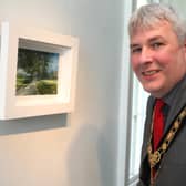 Mayor of Causeway Coast and Glens Borough Council, Councillor Richard Holmes, views the ‘Close to Home’ exhibition by Maurice Orr at Flowerfield Arts Centre