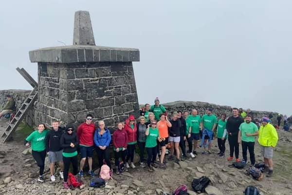 Staff who took part in the climb in aid of NSPCC's Childhood Day.
Aaron Kirkwood centre - back right