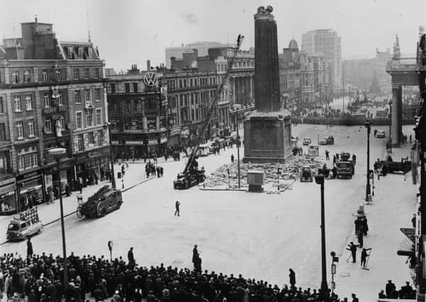 9th March 1966:  During the 50th anniversary year of the 1916 Easter Rising the Irish Army remove the remainder of Nelson's Pillar in the centre of O'Connell Street, Dublin, after it was demolished by an explosion.  (Photo by Keystone/Getty Images)