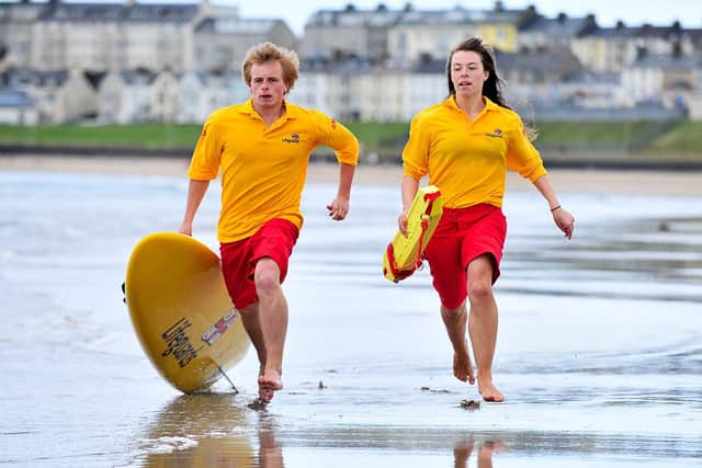 RNLI lifeguards in Portrush: Nick Doran (22) and Dearbhaile McNeill (18)