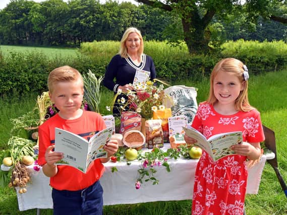 Sister and brother, Grace and Robert Wilson (Age 8 and 7), at the launch of the science-based and curriculum-linked educational resource ‘Northern Ireland: Our Food, Our Story’ for all Northern Ireland Primary Schools, with its author Dr. Vanessa Woods