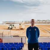 Oran Kearney pictured in front of the new pitch installation works at The Showgrounds. PICTURE: David Cavan