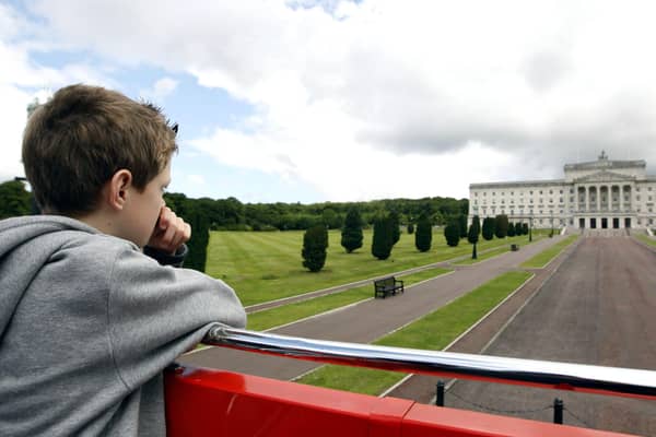 Eight year-old Joule Dallas from Co Tyrone looking at Stormont Building onboard the Belfast City Sightseeing Open Top Bus Tours in 2009. Picture: Diane Magill/News Letter archives