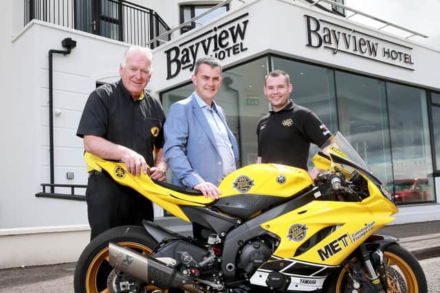 Pictured is Clyde Shanks with Clerk of the Course, Bill Kennedy MBE and road racer Darryl Tweed