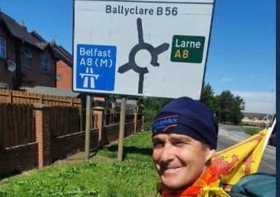 'Speedo Mick' is making his way to Larne from Belfast as part of his charity trek.