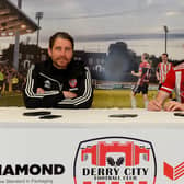 Derry City manager Ruaidhri Higgins and new signing Jamie McGonigle after the striker completed his move from Crusaders on a three and a half year deal. Photograph by George Sweeney.