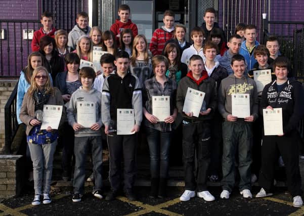 Pupils from Cambridge House and St. Louis Grammar schools who received certificates after completing their Shared Education Programme. INBT04-217AC