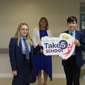 Mrs Frances Pepin, Vice Principal and pupils receive the Take Five Accredited Status award from Chris Lindsay of the Education Authority (NI)
