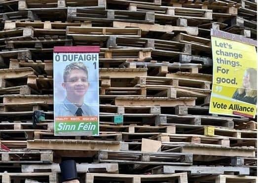 Posters of a Sinn Féin Council candidate Callum O’Dufaigh and Alliance leader Nioami Long appeared on a bonfire in Rectory area of Portadown.