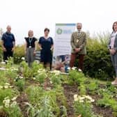 Mayor Cllr William McCaughey visits Islandmagee Community Garden one of the five projects in Mid and East Antrim which received NHLP funding