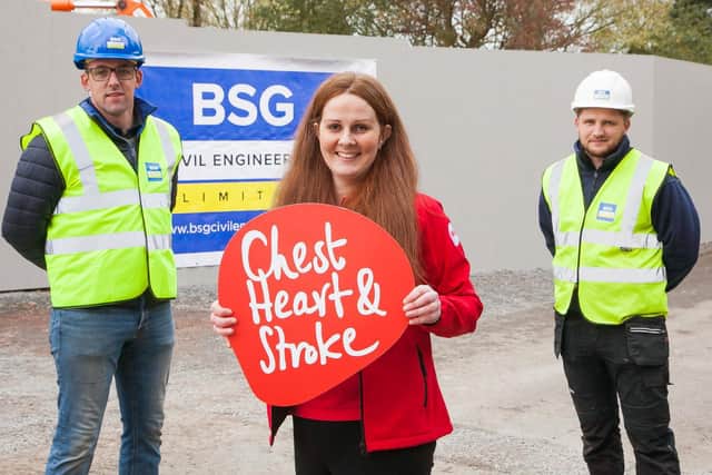Aidan Corbett (site engineer) and Michael Watson (project manager) from BSG with Stephanie Allen (workplace health and wellbeing coordinator) from NICHS.