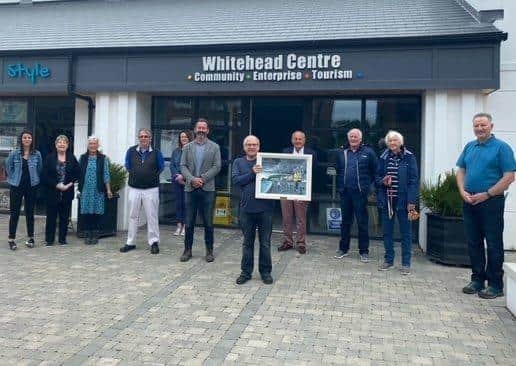 Rev Ian Carton with Martin Clarke, acting chairman of Whitehead Community Association and representatives of the Association, Blackhead Path Preservation Group and other community groups.